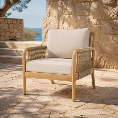 Fauteuil club extérieur avec structure robuste en bois d'acacia et détails en corde tressée à la main, siège de jardin avec coussins amovibles et résistants à l'eau, piètement à lattes