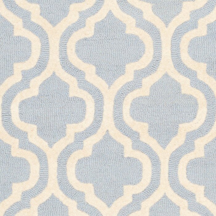 Handgefertigter Teppich Noble aus Wolle in Blau/Elfenbeinfarben