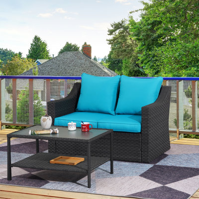Causeuse d'extérieur en rotin 2 pièces avec table Amento