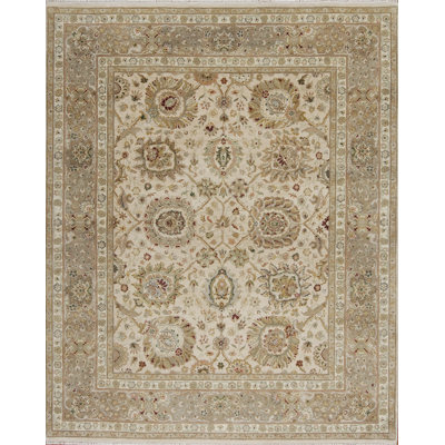 Tapis ivoire / corail en laine noué à la main Passions