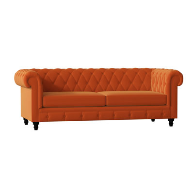 Canapé Chesterfield à accoudoirs roulés