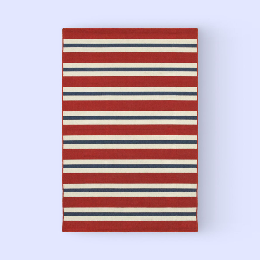 Red, white, and blue striped rug.