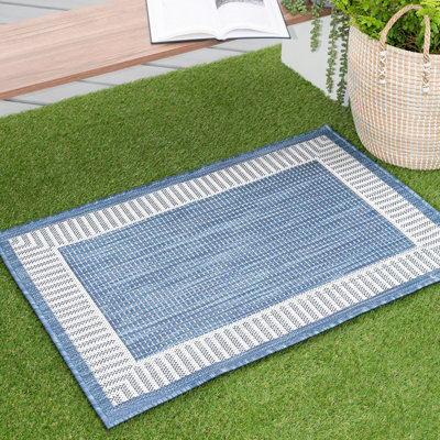 Tapis bleu à tissage plat Dexter