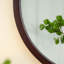 Miroir mural circulaire avec cadre en bois-655637365