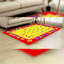 Tapis rouge/jaune à motif géométrique Philpot