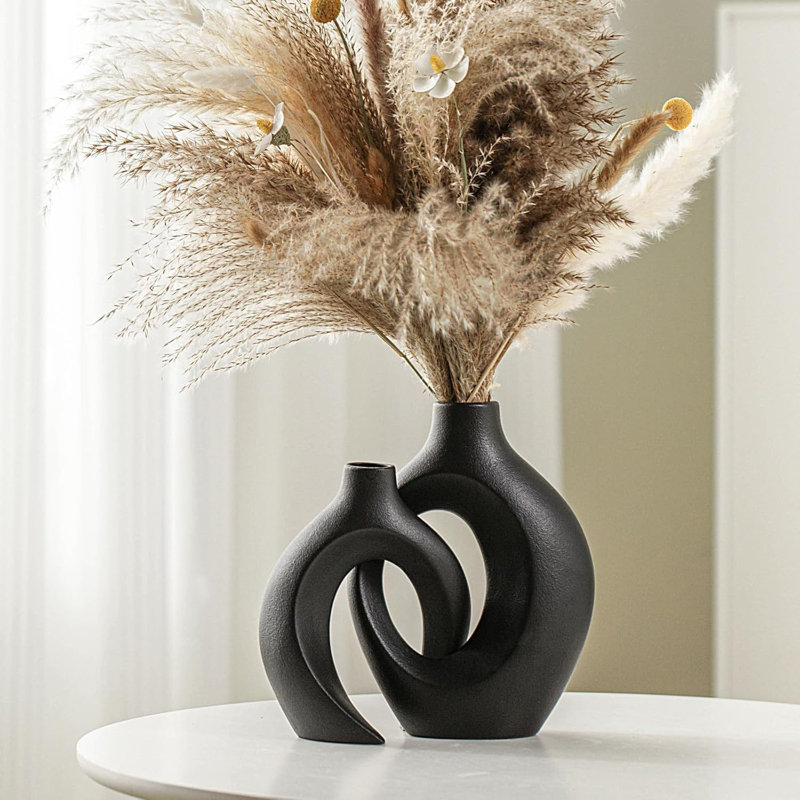 Nestled In A Hollow Ceramic Vase, Black