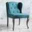 Chaise d'appoint en sarcelle avec bordure cloutée et tissu à oreilles capitonné
