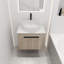 Meuble-lavabo de 24 po en chêne blanc. Fixé au mur avec lavabo en céramique et porte sécurisée au design moderne. Chêne à fermeture en douceur et grand espace de rangement