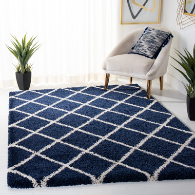 Audwen Geometric White/Navy Area Rug