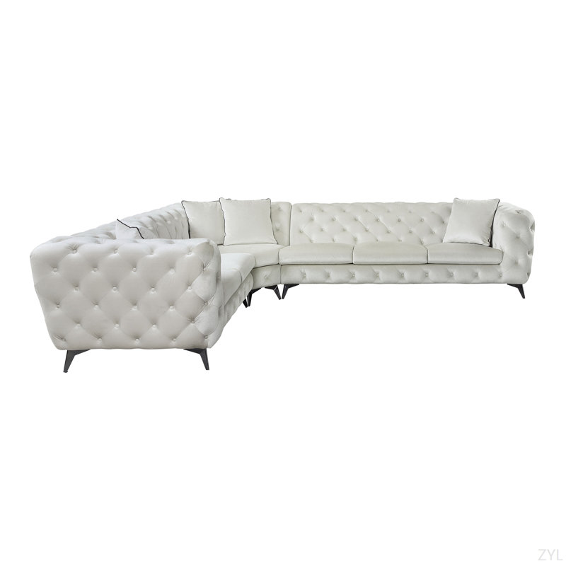 Canapé modulaire en tissu beige avec 4 coussins