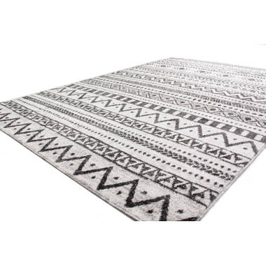 https://assets.wfcdn.com/im/28787606/resize-h380-w380%5Ecompr-r70/2118/211800036/Aholah+Handmade+Performance+Ivory%2FCharcoal+Rug.jpg