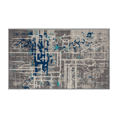 Tapis gris soyeux et moelleux