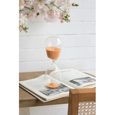 Sablier décoratif au design profilé transparent et sable terre cuite