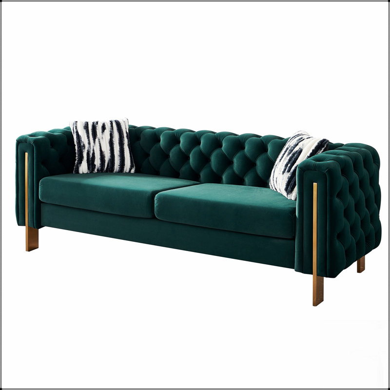 Canapé moderne en velours avec dossier capitonné et structure durable, pour plus de confort et de style dans tout espace de vie.