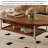 Simple oval-shaped solid wood coffee table-112745385