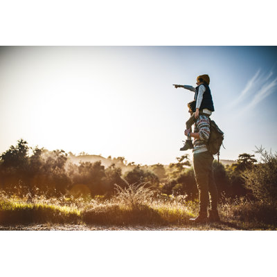 Father Carrying Son On Shoulders by Wundervisuals - No Frame Art Prints on Canvas