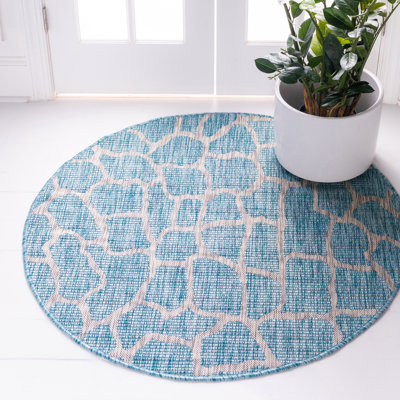 Tapis intérieur / extérieur bleu / gris à imprimé animal Murrell