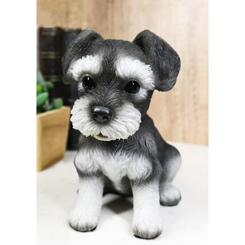 Adorable figurine de chiot miniature Schnauzer