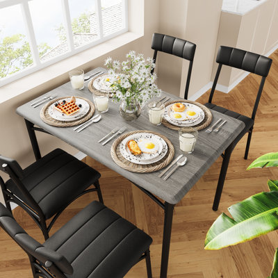 Ensemble de table de salle à manger 5 pièces pour 4 personnes - Table rectangulaire peu encombrante avec chaises rembourrées - Métal et bois modernes, assemblage facile - Parfait pour un appartement, un studio, une petite salle à manger - Gris ciment