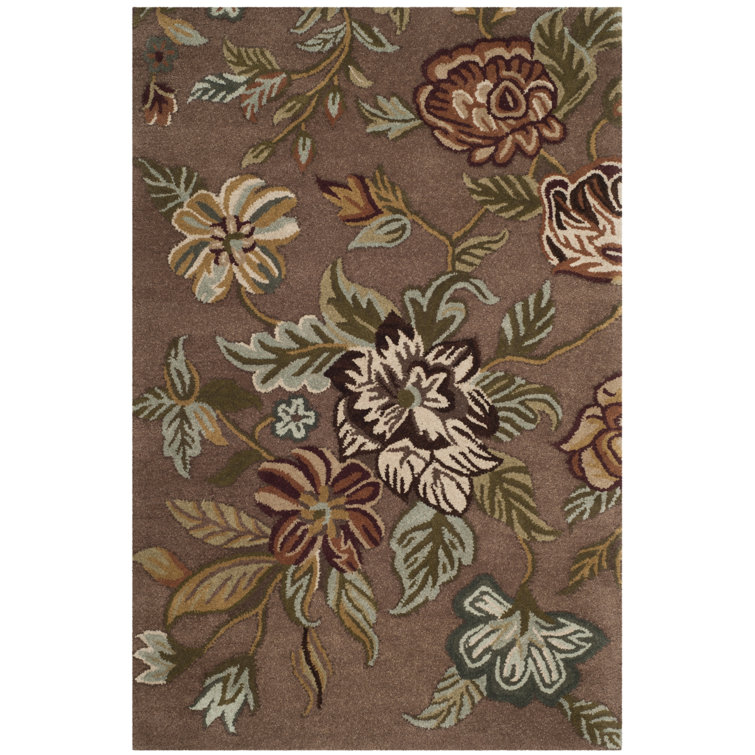 Emrick Hand Hooked Wool/Cotton/Latex Floral Rug in Brown
