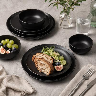 Ensemble de 12 bols et assiettes en grès émaillé noir mat 12 pièces, sûrs et non toxiques, empilables, convenant à quatre personnes, allant au micro-ondes et au lave-vaisselle.