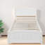 Lits simples blancs peu encombrants, structure en bois massif avec tiroirs de rangement