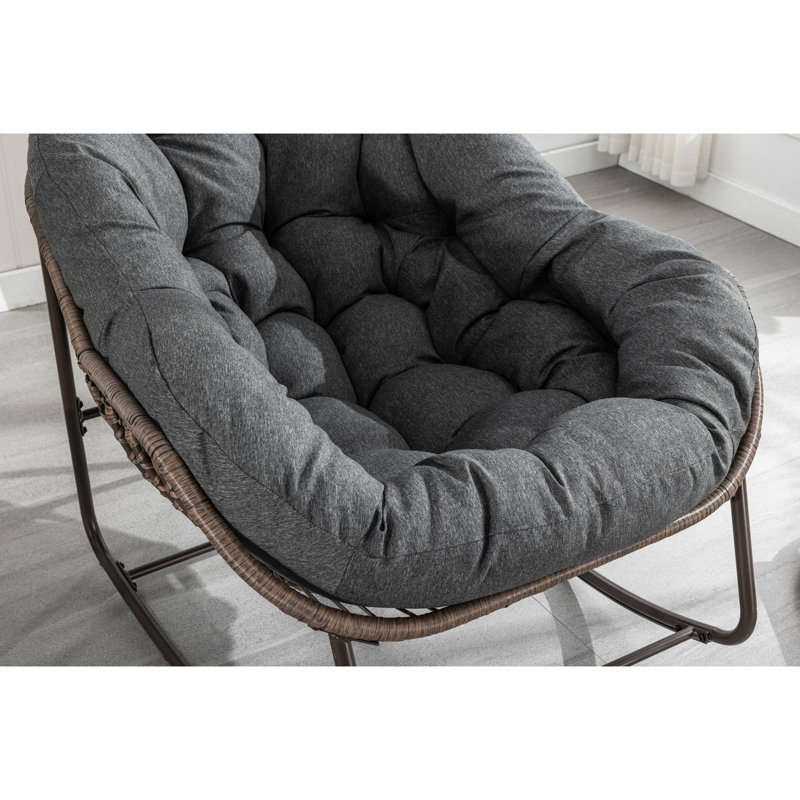 Fauteuil inclinable gris avec chaise berçante