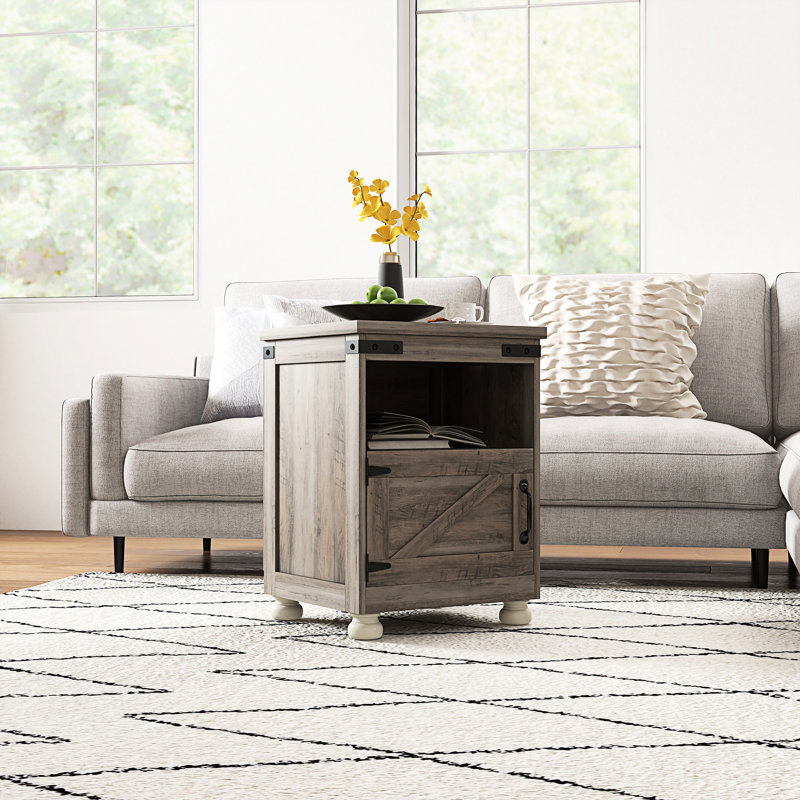 Petite table d'appoint grise. Table de bout avec rangement. Tablette ouverte et armoire spacieuse. Pieds modernes en bois. Polyvalent. H 17,7 po x P 15,4 po. P 23,6 po. Peut contenir 110 livres de rangement gris. Style Living