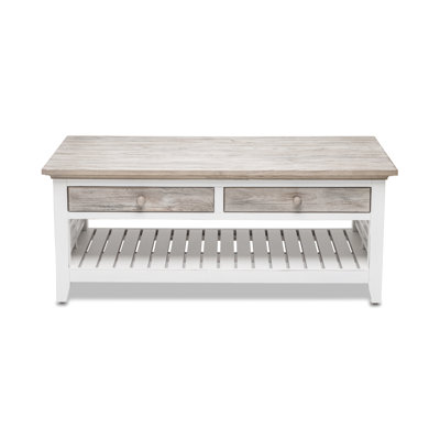 Timeless Coastal Charm Solid Mindi Wood Coffee Table with Dapple Grey and White Distressed Finish, Smooth Dovetail Drawer Storage, and Natural Wood Grain Detail