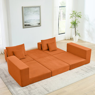 Canapé-lit moderne en nuage orange avec siège amovible et profond, revêtu de velours côtelé, idéal pour les petits espaces de salon, avec coussins décoratifs sans siège en L