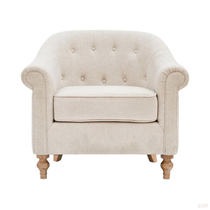 Fauteuil capitonné