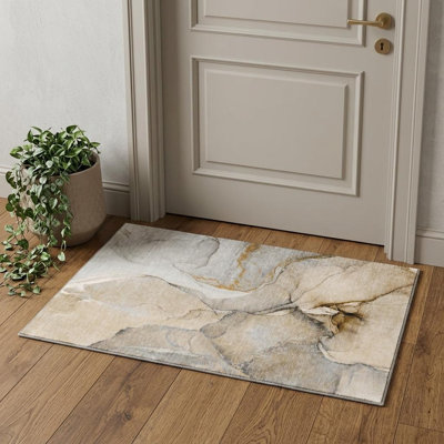 3' X 5' Beige Brown And Ivory Abstract Washable Area Rug With UV Protection