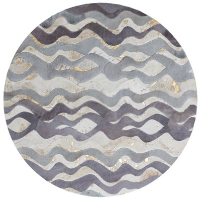 Tapis unique en peau de vache