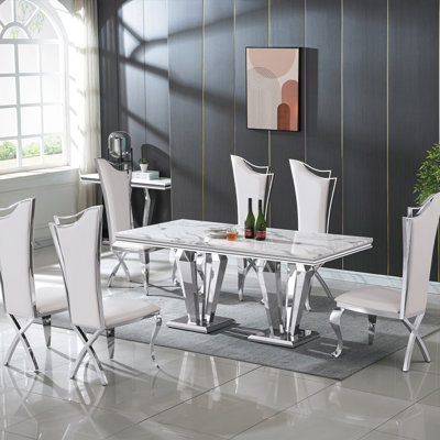 Ensemble de salle à manger 7 pièces avec plateau en marbre et chaises rembourrées - options velours et polyuréthane, pieds en acier inoxydable