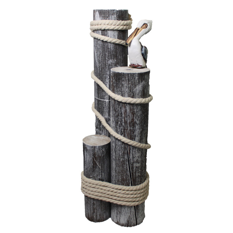 Souche Corriveau avec sculpture de pélican