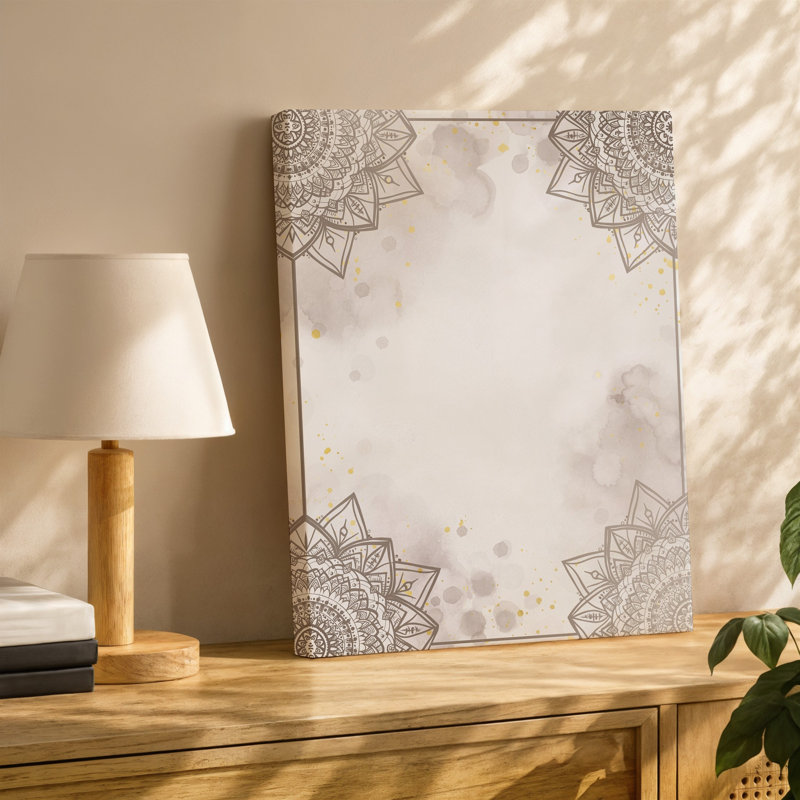 La toile crée un fond serein et élégant avec des motifs d'art délicats complexes de mandala dans des tons beiges doux