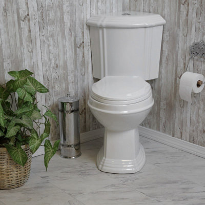 The Renovators Supply Inc. 0.8 GPF Elongated 17 Chair Height Floor Mounted with Seat Included Toilet