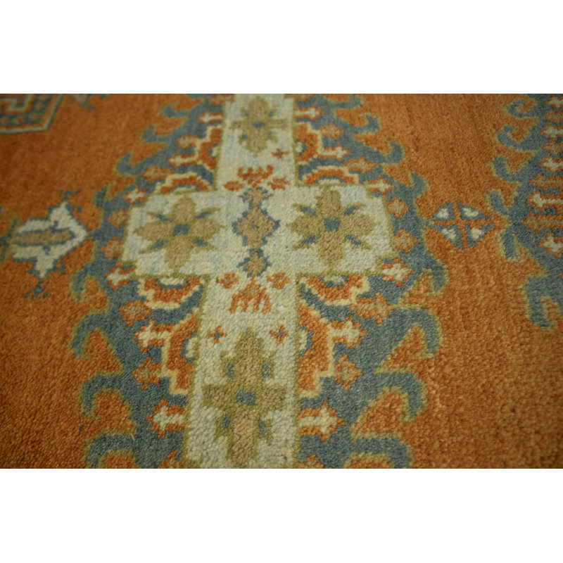 Tapis orange en laine noué à la main à motif géométrique