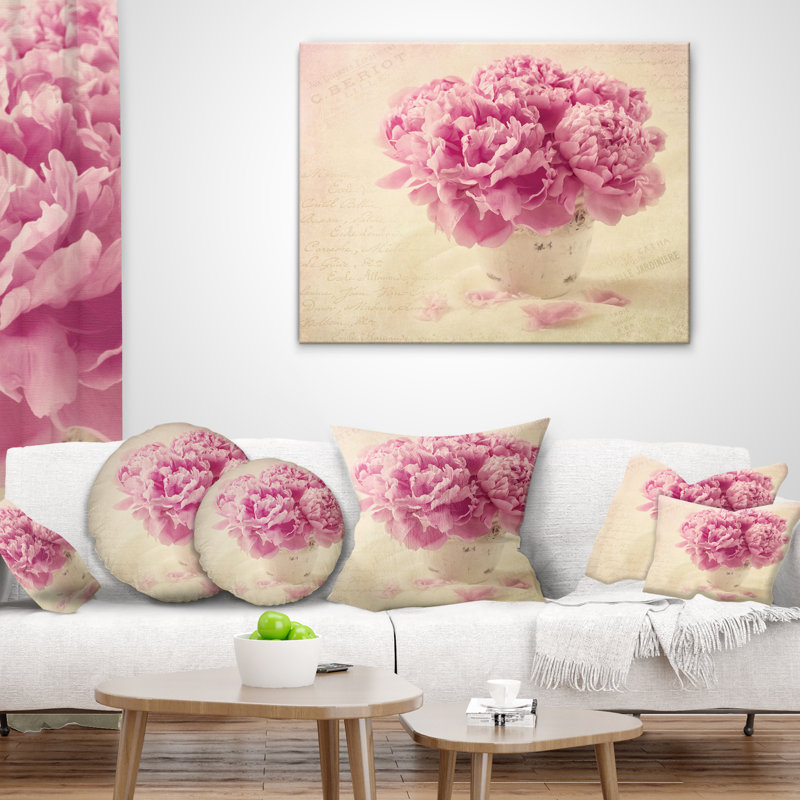 Coussin lombaire en fleurs pivoine sur table
