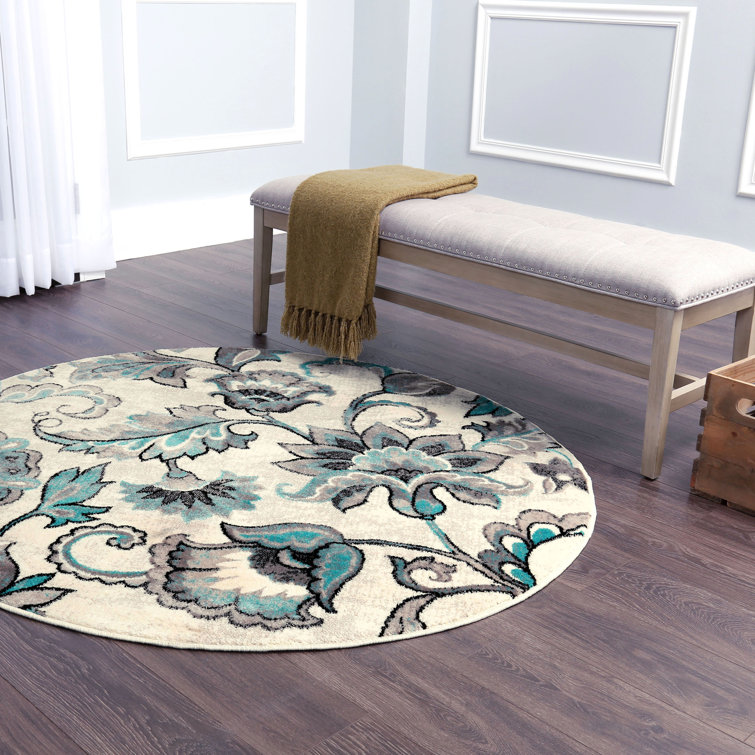 Tapis à motif floral ivoire et bleu