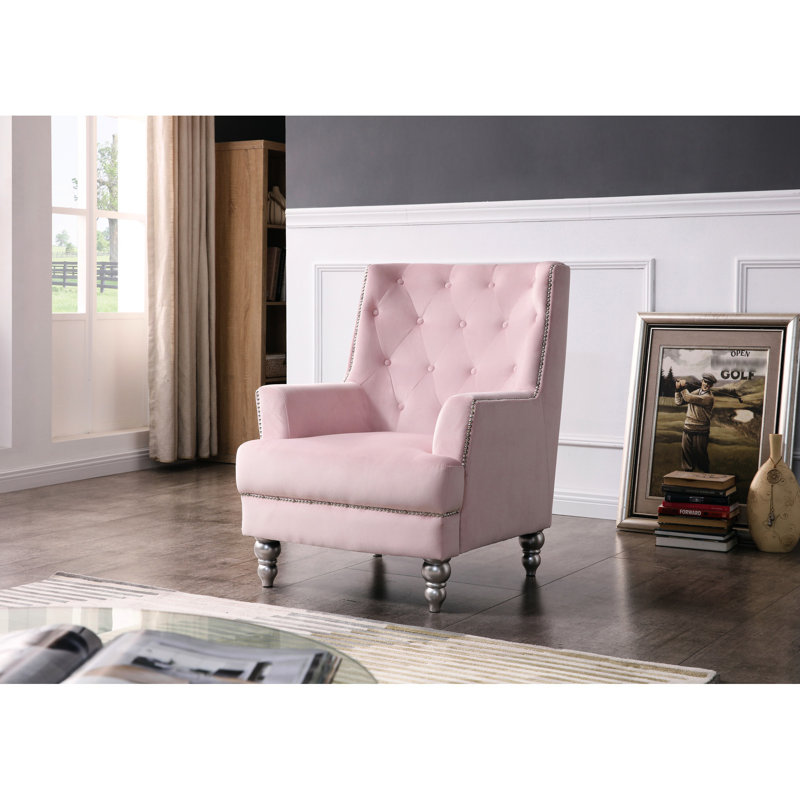 Charmant fauteuil traditionnel à accoudoirs ronds