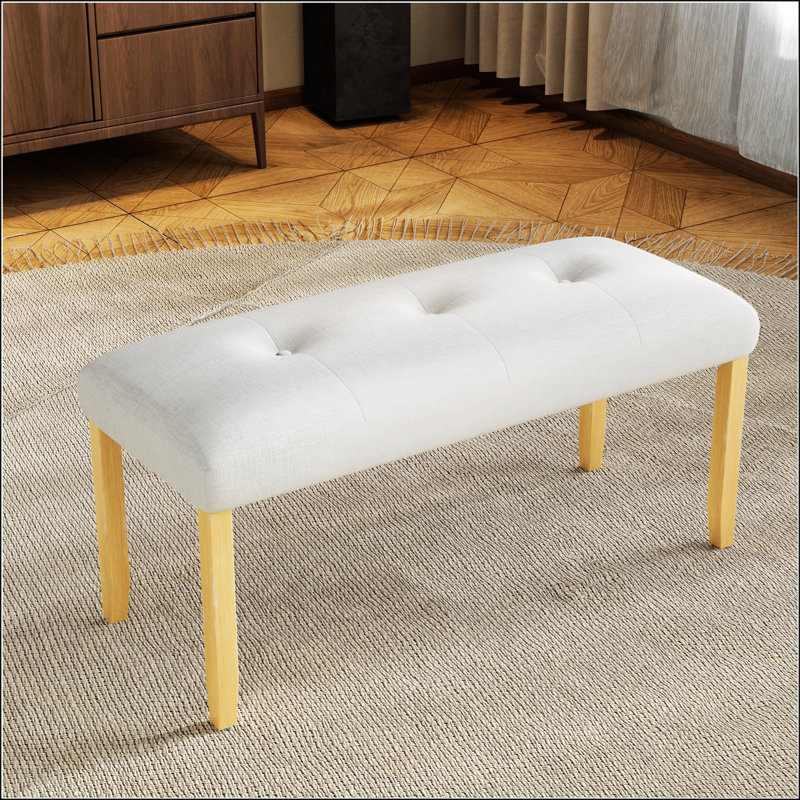 Banc rembourré capitonné pour les chambres à coucher modernes, les salles à manger et les espaces de vie avec des sièges confortables et un design élégant.
