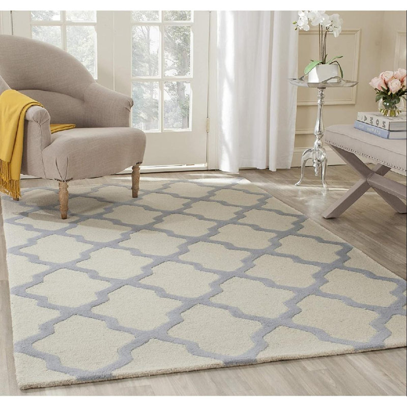 Tapis géométrique ivoire / bleu clair en laine touffeté à la main à motif géométrique 9 pi x 12 pi