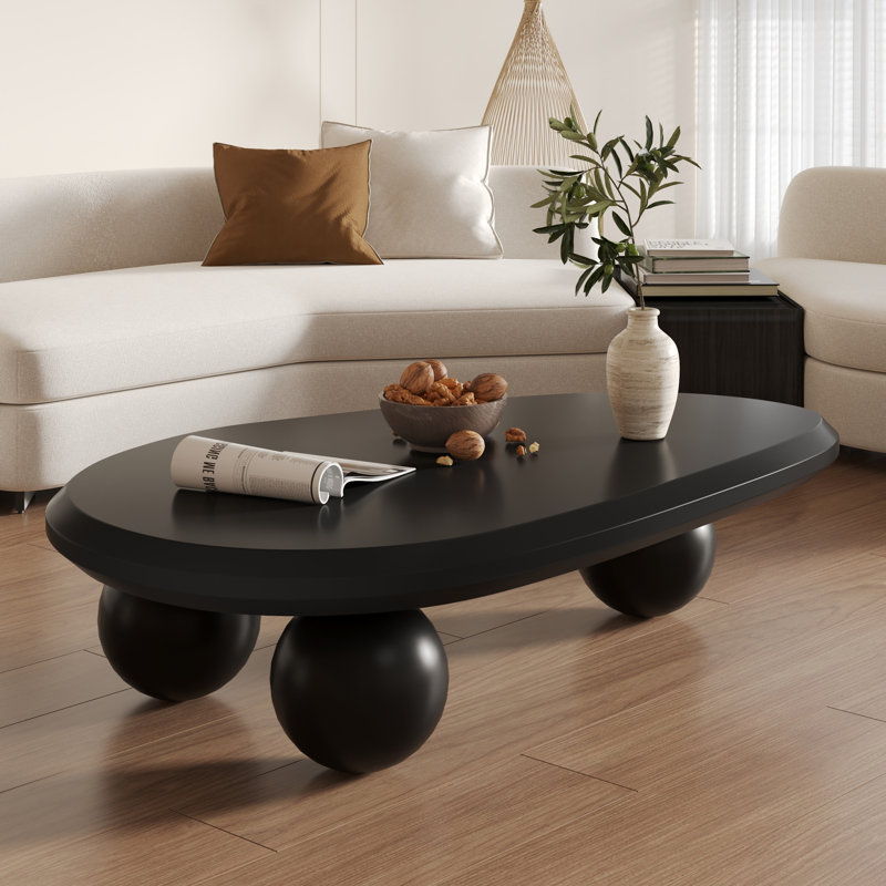 Table basse moderne ovale de 51 pouces, couleur crÃ¨me, noir et brun, avec trois pieds ronds, Plateau noir / base noire, Noir