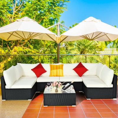 Finnbar Patio 7 Piece Rattan Sectional Seating Group with Cushions by Latitude Run