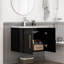 Meuble-lavabo noir élégant à charnières à fermeture douce avec poignées dorées, idéal pour les salles de bain modernes