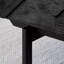Table basse noire sculptée-110476767