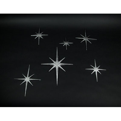 Mid-Century Modern black enamel cast iron 8-point starburst wall sculptures — set of 6, 4.25-8.75" L x 0.25" W x 4.75-12" H