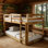 Lits simples superposés en bois massif avec échelle