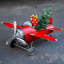 Petit avion avec arbre de Noël illuminé